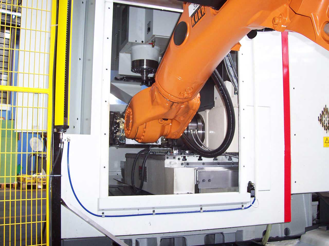 Robot di Aservimento Macchine Utensili